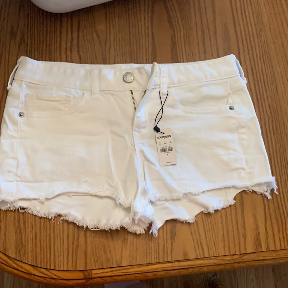 Express white jean shorts size 4